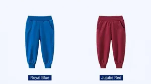 Detailed view of kids cotton joggers in royal blue and burgundy colors with ribbed cuffs