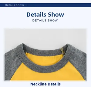 Detail of yellow and grey raglan sleeve neckline on cotton knit long sleeve kids tee
