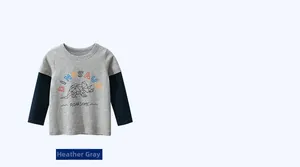Detail of grey and navy long-sleeve boy's T-shirt with geometric dinosaur print and text