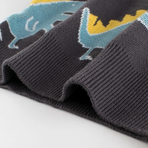 Fashionable dark grey knit kids sweater with cute blue and yellow dinosaur jacquard pattern