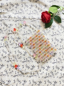 Handmade colorful beaded crossbody phone bag with transparent strap and heart beads