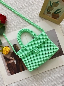 Handmade light green beaded handbag with crossbody strap in summer dopamine style
