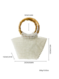 Detail view of pearl beaded handbag with bamboo handle showing precise size measurements