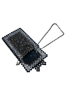 Handmade beaded phone bag with black lattice pattern and metallic chain strap