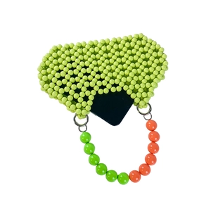 Detail of beaded bag interior showing capacity for a large smartphone and woven beads