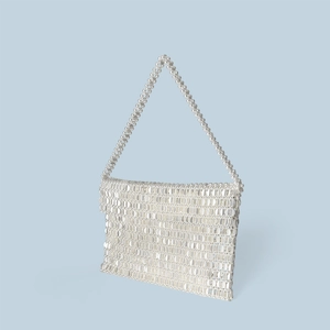 Detailed view of handmade woven beaded silver tote bag with shiny metallic sequin texture