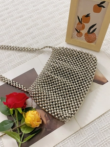 Handmade silver beaded crossbody bag with woven chain strap and retro luxury style