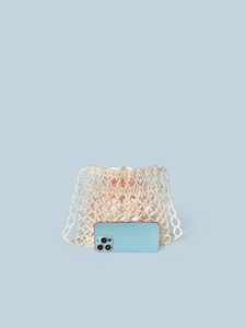 Handmade pearl beaded crossbody bag with pink satin drawstring liner and smartphone reference