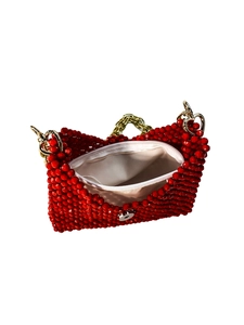 Handmade red beaded handbag with gold chain strap and elegant white satin lining