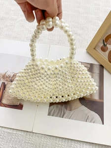 Elegante handgefertigte Perlenhandtasche mit fächerförmigem Design und Griff