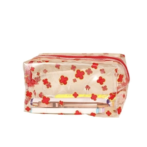 Transparent PVC pencil case with red clover pattern and large capacity storage