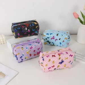 Quilted bow makeup bags in four pastel colors with butterfly prints and zipper closure