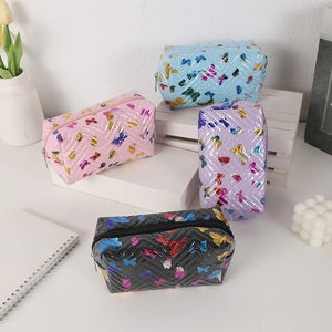 Quilted bow makeup bag with colorful butterfly prints in four pastel colors set