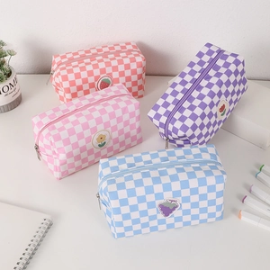 Portable checkered cosmetic bags with cute fruit embroidery in various pastel colors