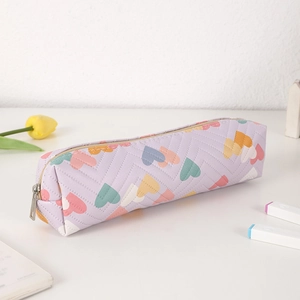 Close-up of lavender quilted heart pencil case with silver metal zipper and soft PU finish