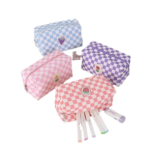 Checkered canvas cosmetic bags in blue, pink, purple, and orange with fruit patterns
