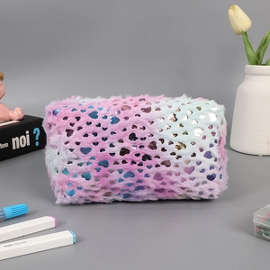 Close-up of plush rectangular pouch with pink-purple gradient and heart sequins