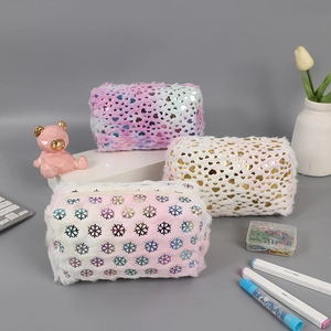 Plush aesthetic pouches with heart and snowflake patterns for stationery and makeup storage