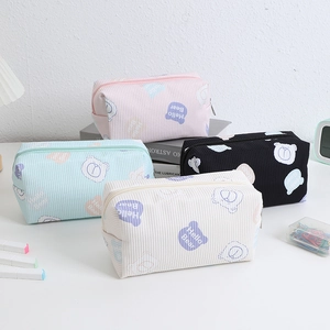 Corduroy Hello Bear cosmetic bags in pink blue black and white with zipper closure