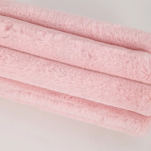 Close-up of soft pink plush fabric with high-quality faux fur texture on a pencil case