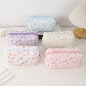 Quilted floral pencil case made of soft fabric with zipper closure for large capacity storage