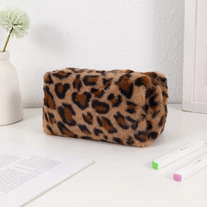 Detail of leopard print plush organizer bag showing soft texture and spacious interior
