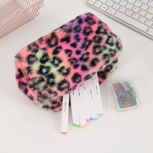 Macro view of plush leopard print pencil case with soft faux fur texture and colorful pattern