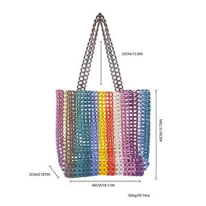 Detail showing dimensions of a colorful handmade beaded beach tote bag with measurements