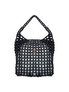 Detail of hand-woven black beaded mesh handbag with ivory drawstring liner and leather tag