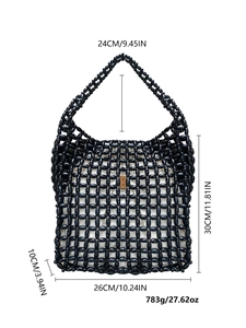 Macro detail of handmade black beaded tote bag showing size specs and weave texture