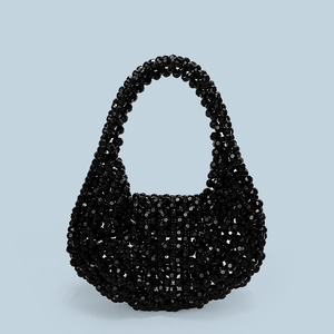 Detailed view of handmade black acrylic beaded hobo bag with sparkling textured beads