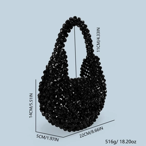 Detail of black beaded handbag with dimensions 22cm x 14cm and handmade acrylic facets