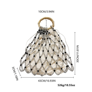 Detailed view of pearl mesh tote bag dimensions with bamboo handles and silver beads