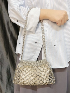 Silver beaded woven shoulder bag featuring a geometric mesh structure and metal chain strap
