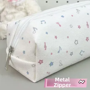 Portable pencil case with colorful musical notes and stars pattern, featuring a metal zipper