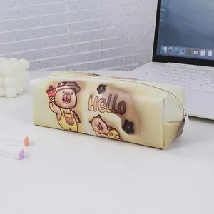 Detail of cream Capybara pencil case with bear print and sturdy top zipper closure