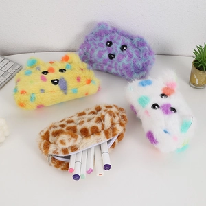 Plush animal print pencil cases in leopard and polka dot faux fur with zipper closure