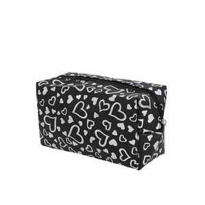 Portable heart pattern makeup bag with large capacity and stylish black zip closure