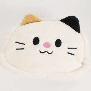 Close-up of soft plush cat pencil case with embroidered eyes and colorful ears