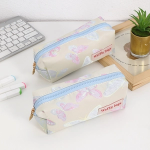 Minimalist butterfly pattern large capacity double pencil case set on white desk