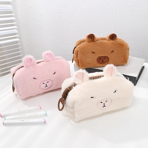 Three cute plush Capybara pencil cases in pink, brown and white with large ring zippers
