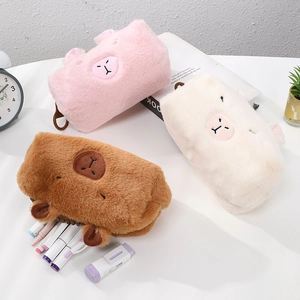 Detailed plush capybara stationery bags in pink, white, and brown with zipper and handle