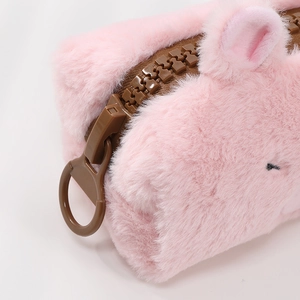 Detail of pink Capybara plush pencil case showing soft faux fur and chunky brown zipper