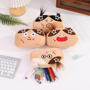 Detailed view of plush cartoon pencil cases with expressive faces on a cozy study desk