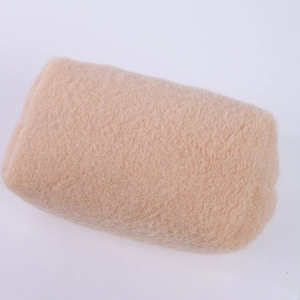 Detail of plush beige stationery pouch featuring soft fluffy fiber texture and neat finish