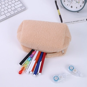 Close-up of cream plush pencil case with large capacity for stationery on the desk