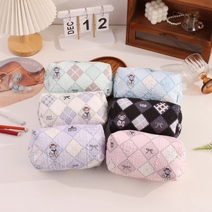Quilted cartoon pencil case in multiple colors with bear patterns and zipper closure