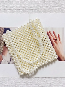 Elegant white acrylic pearl beaded crossbody bag in a minimalist square handbag style
