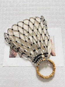 Handmade pearl bead mesh handbag with bamboo handles and canvas drawstring liner