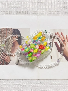 Handmade colorful heart-shaped beaded mini bag with transparent round bead chain strap
